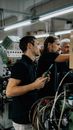 Engineers collaborating in an advanced manufacturing facility, focusing on machinery operations.